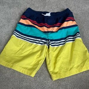 Boys swim trunks by Carters. Elastic waist with mesh interior.